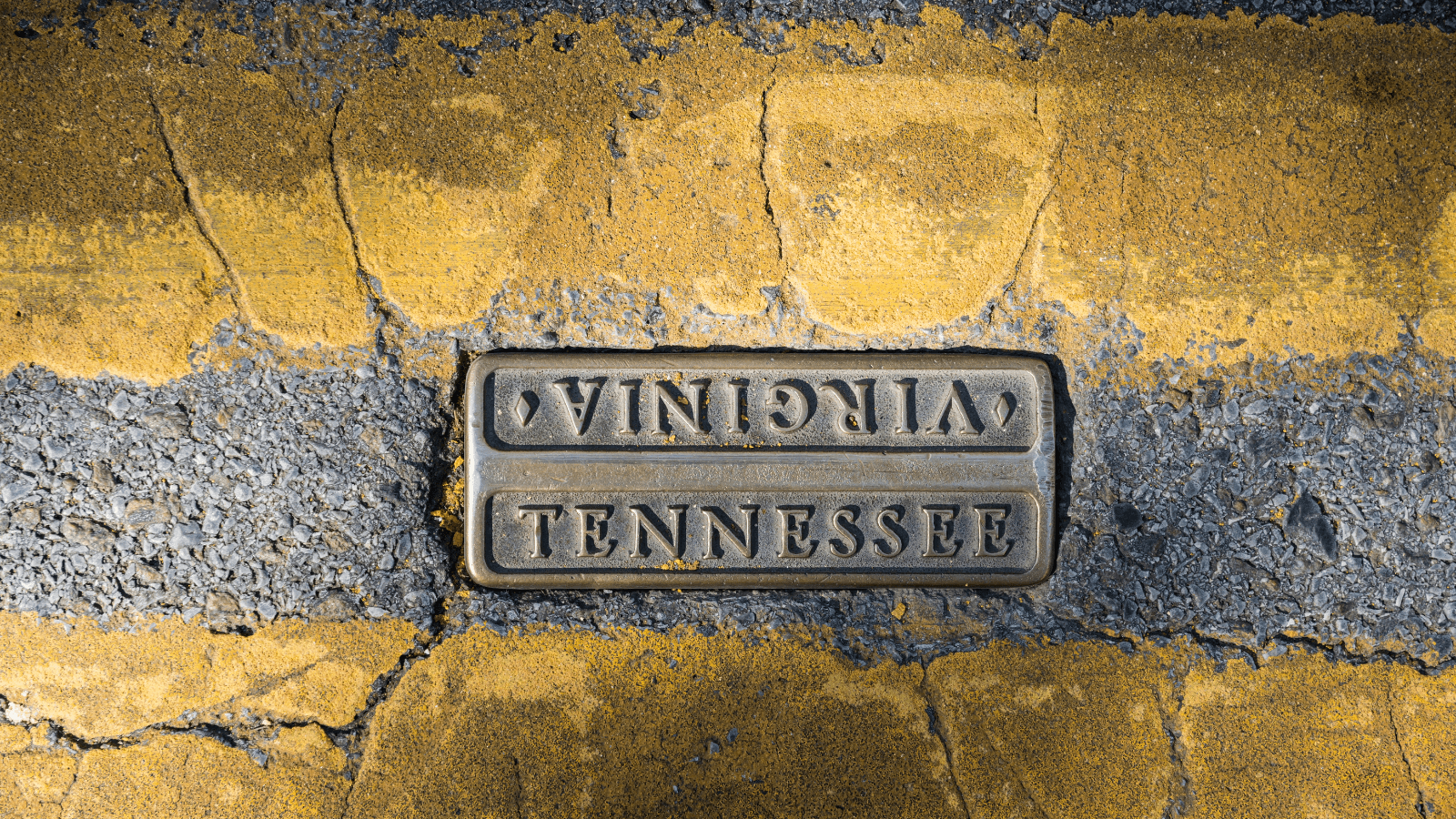 A state-line marker representing Bristol's division between Tennessee and Virginia.